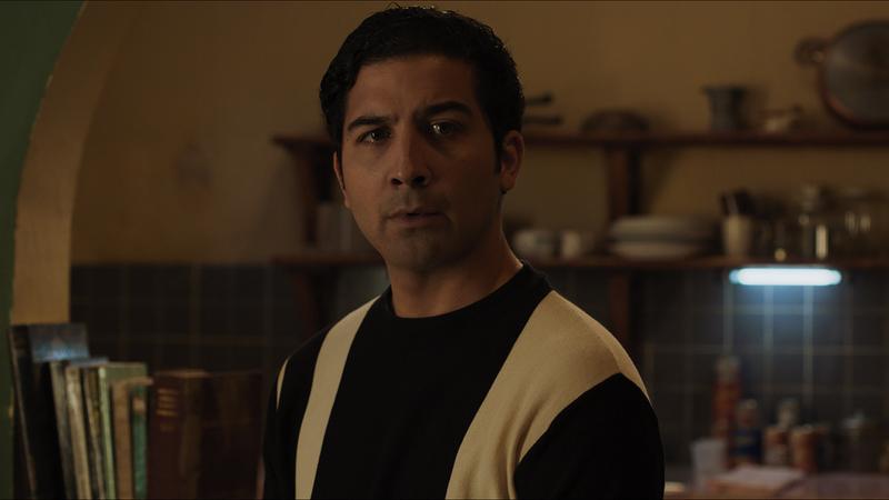 Cristóbal in the kitchen doorway
